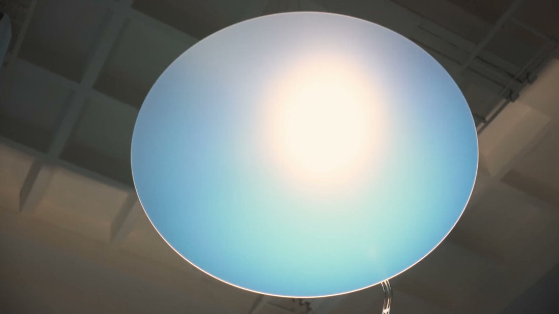 Looking up at Sunday Light's sheet, a blue sky glow with a warm white centre