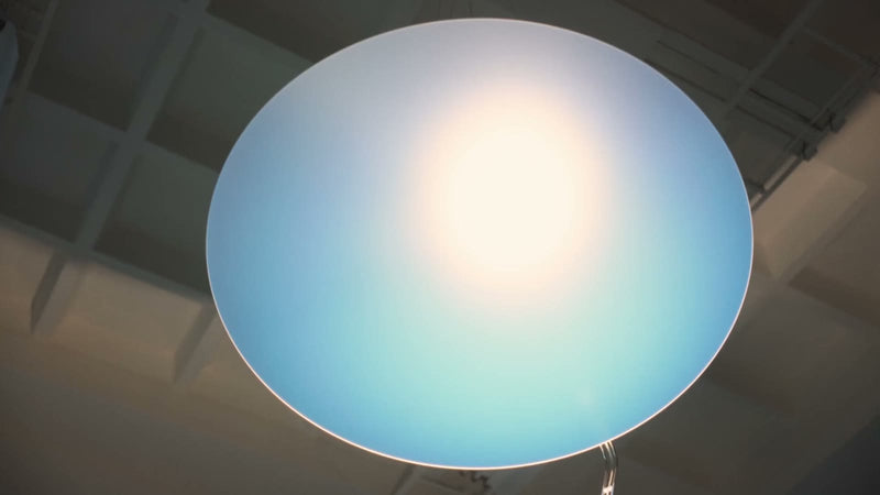 Looking up at Sunday Light's sheet, a blue sky glow with a warm white centre