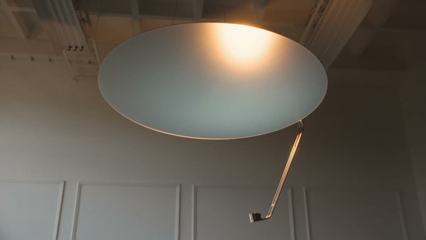 Sunday Light seen from below, its sheet glowing with a warm sun-like centre